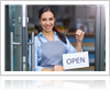 Woman Turning Over Open Sign